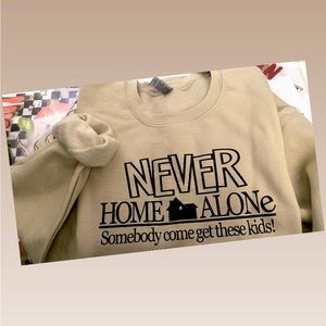 Never Home Alone Sweatshirt